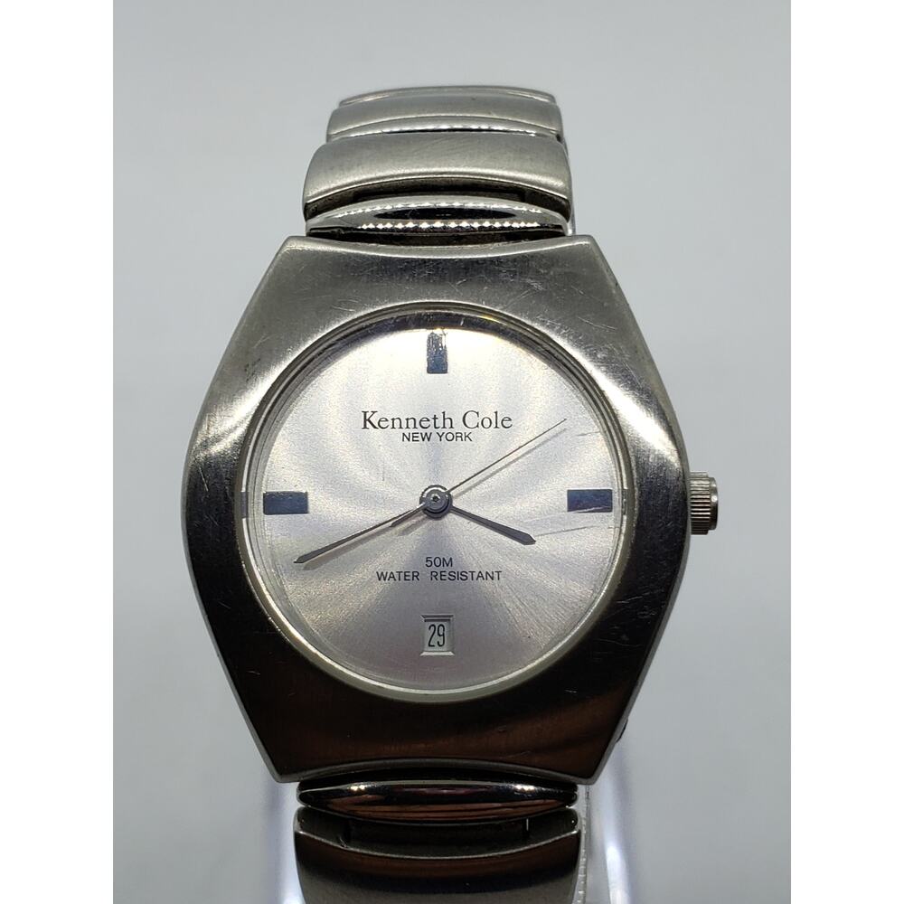 Kenneth Cole KC4145 women's watch. Calendar date on face. Silver on silver face